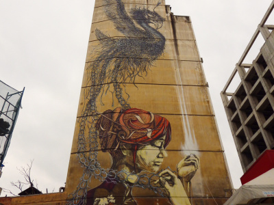 In 2011 the Face Art Public Mural Project commissioned wall art during the 15th Biennial of Young Artists in Thessaloniki, Greece. 